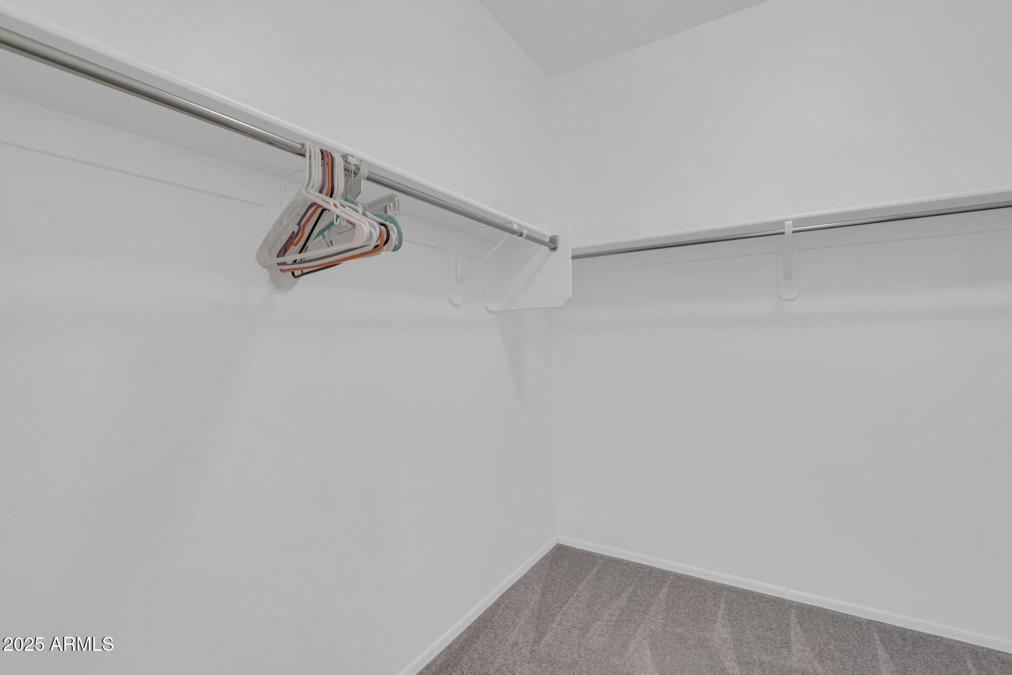 6556 East Via Arroyo Azul Tucson, AZ 85756 - Photo 34 of 75 a view of small space with racks on the wall