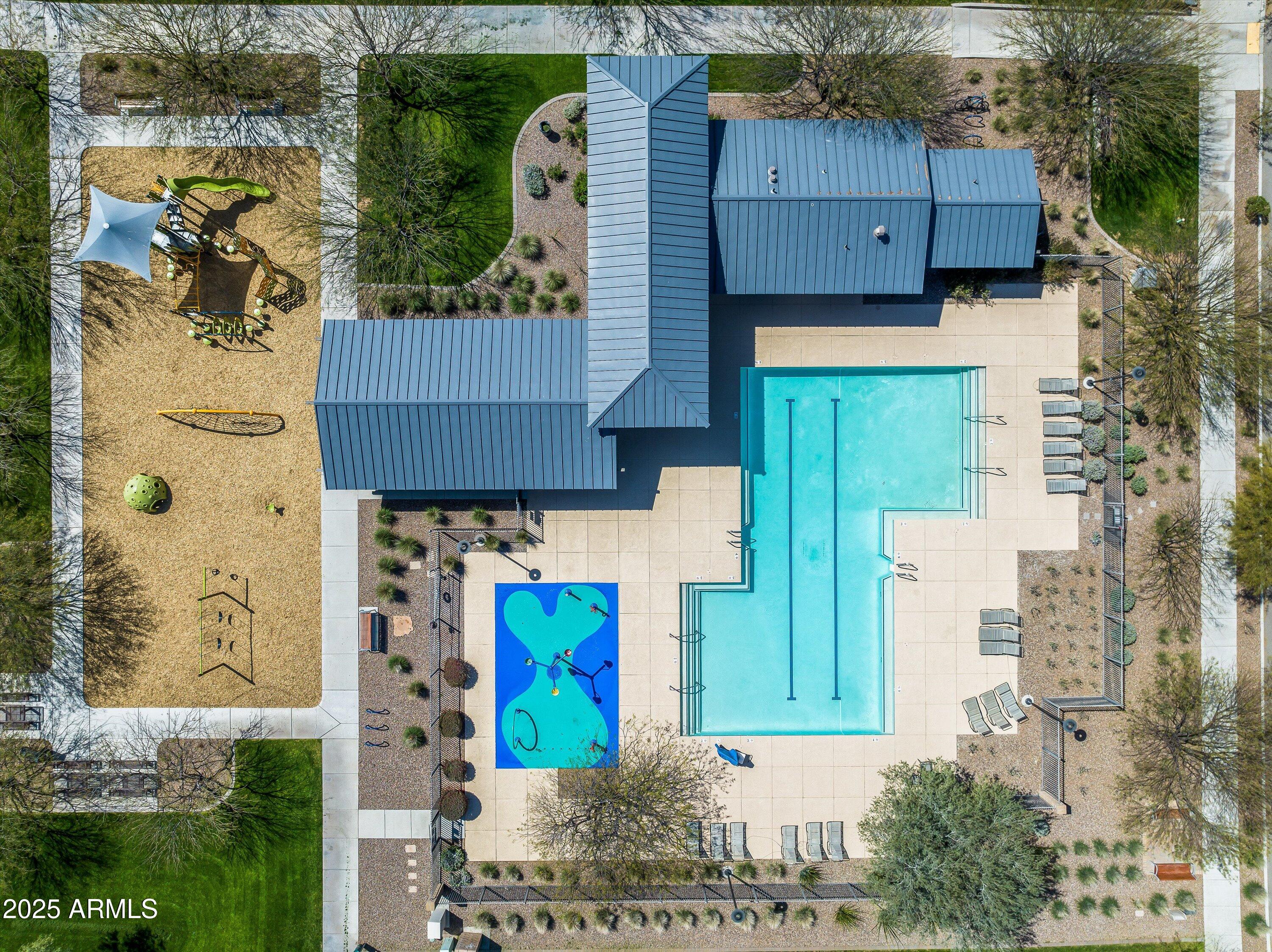6556 East Via Arroyo Azul Tucson, AZ 85756 - Photo 49 of 75 an aerial view of a house with a yard