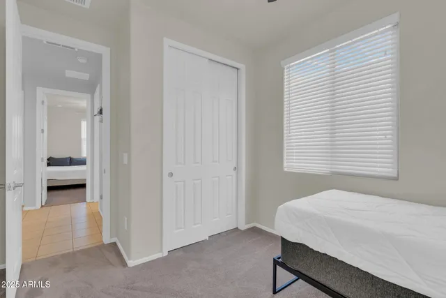 a bathroom with a sink toilet vanity and tub