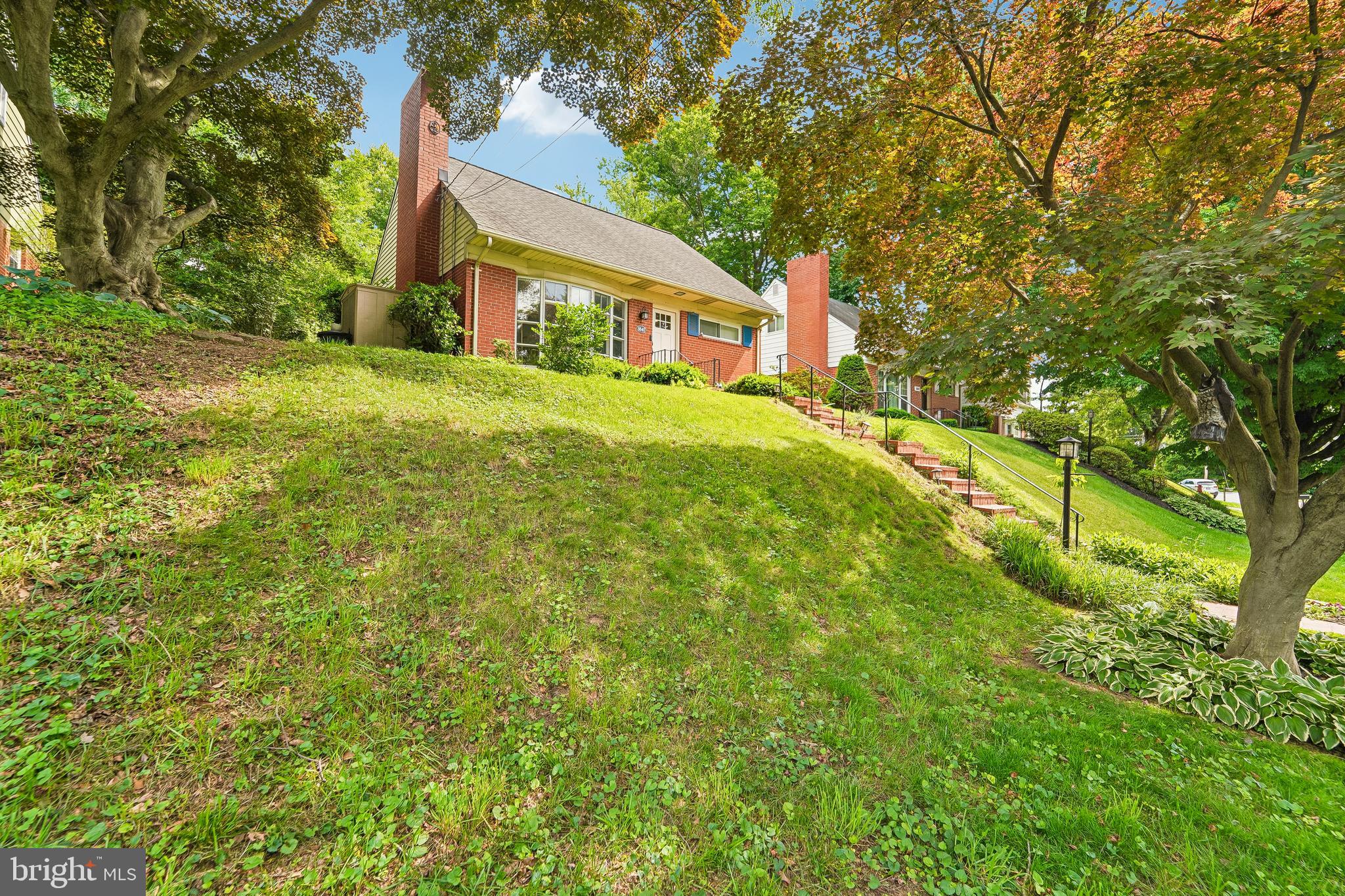 6640 Loch Hill Road Baltimore, MD 21239 - Photo 33 of 35 a house view with a garden space