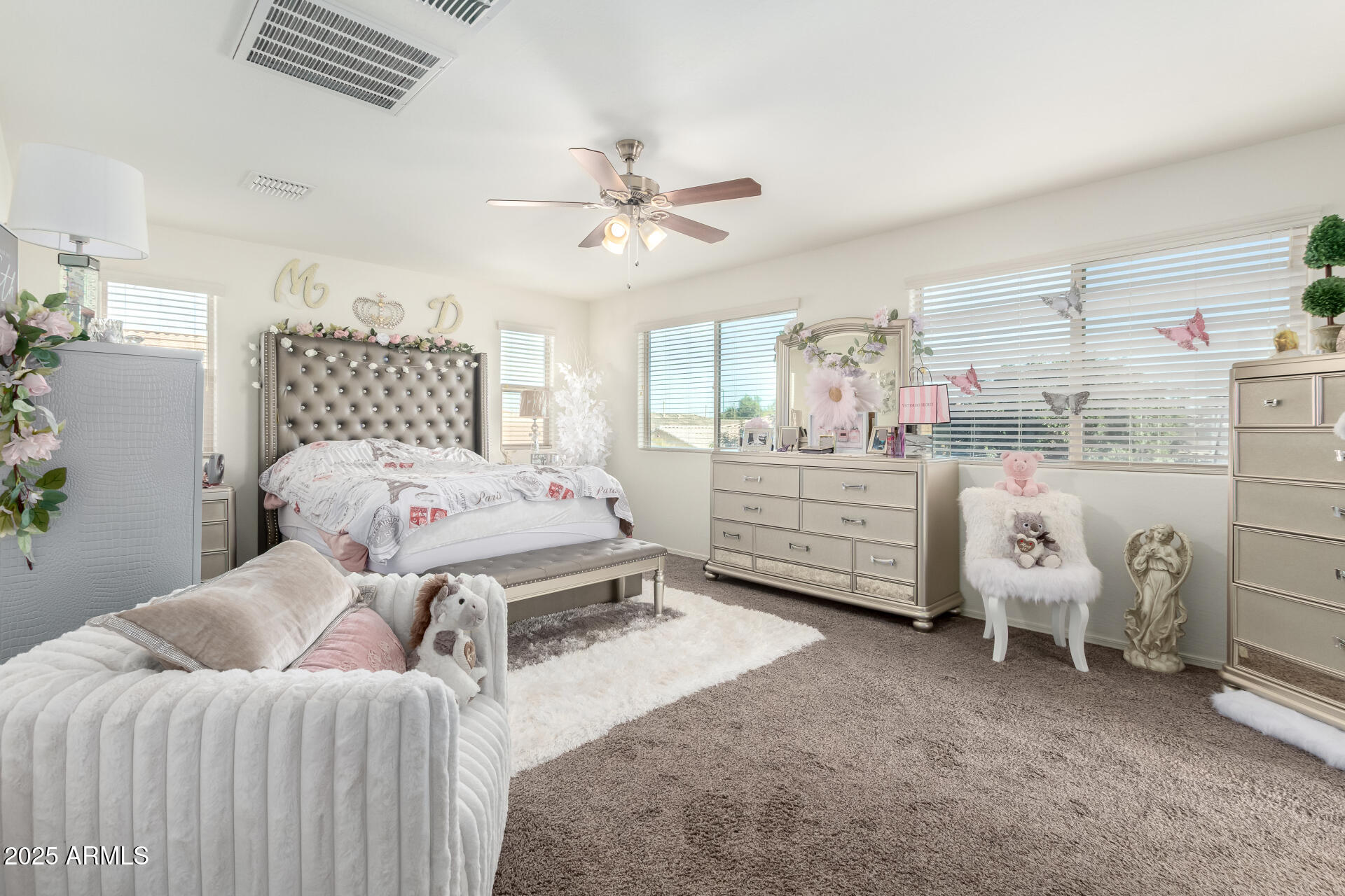 2665 East Gillcrest Road Gilbert, AZ 85298 - Photo 20 of 48 a bedroom with a bed and a chandelier