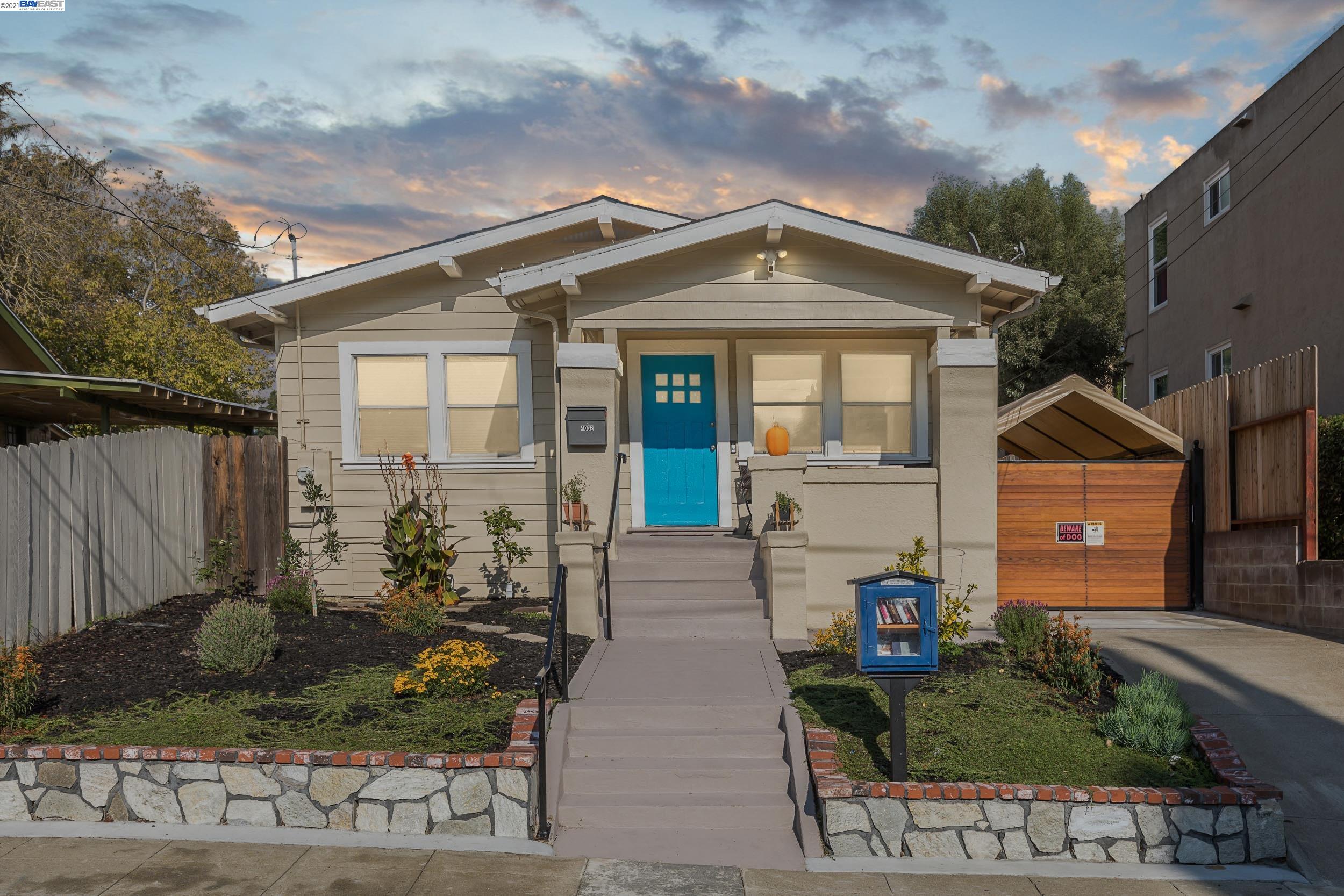 4082 Lyon Avenue Oakland, CA 94601 - Photo 1 of 1 a front view of a house with garden