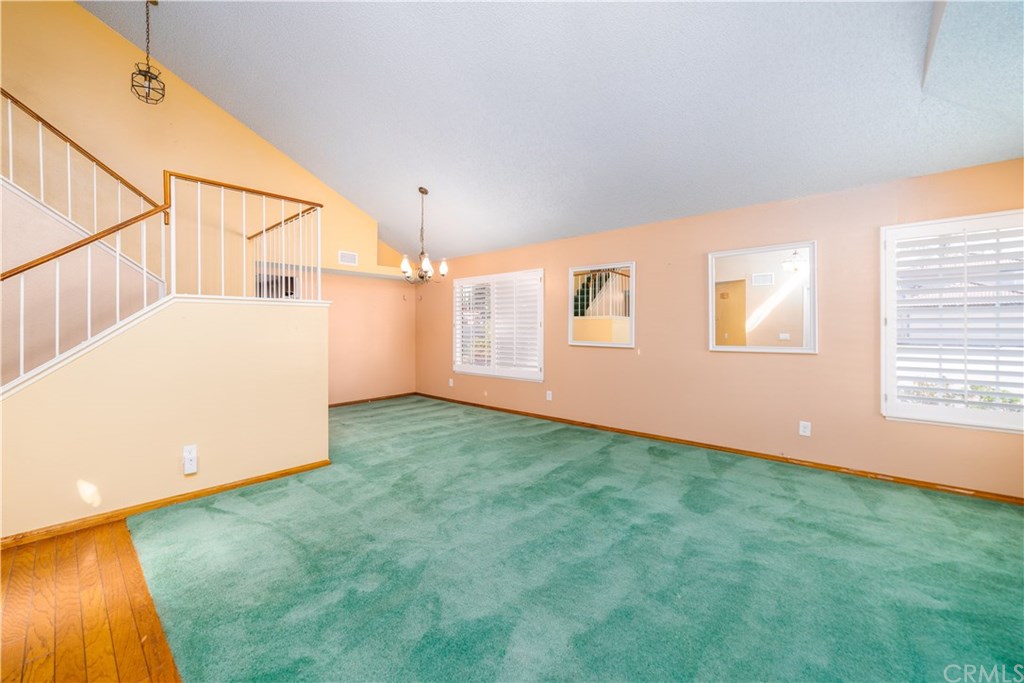 20440 Tobira Lane Riverside, CA 92508 - Photo 5 of 17 Living room with vaulted ceiling.