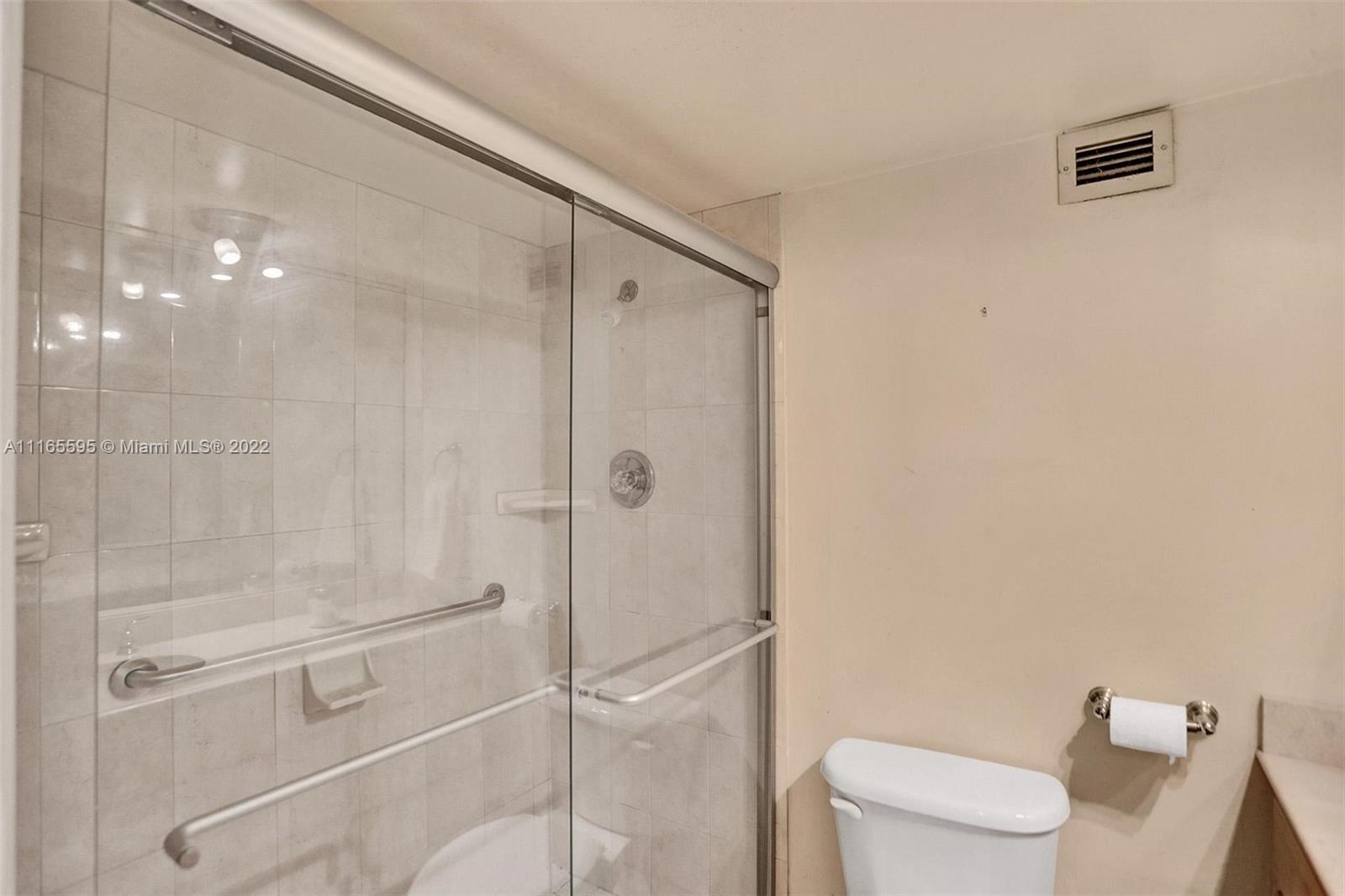 Millionaire's Row Miami Beach, FL 33140 - Photo 23 of 41 a bathroom with a shower and toilet