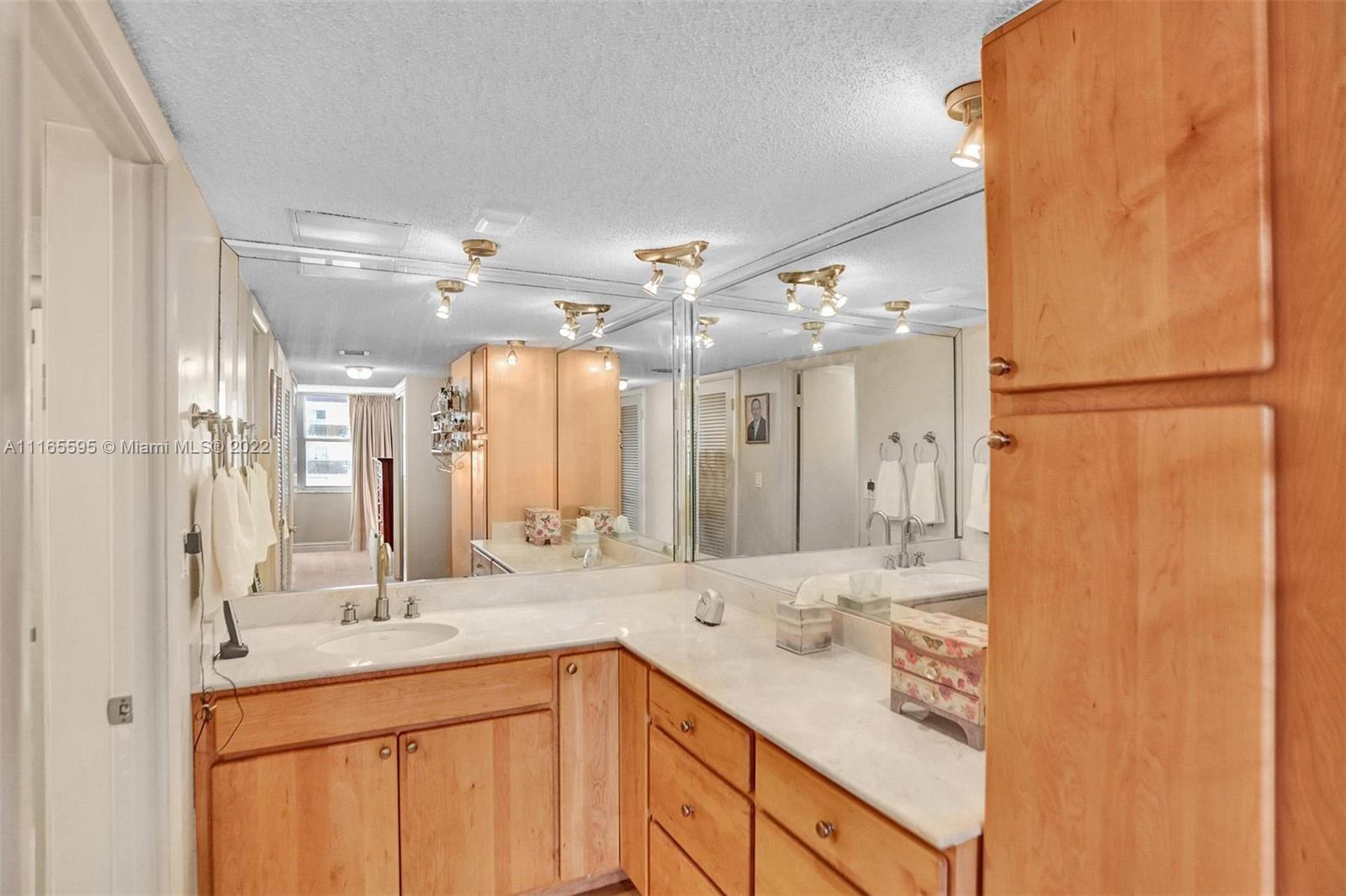 Millionaire's Row Miami Beach, FL 33140 - Photo 36 of 41 a bathroom with a double vanity sink mirror and