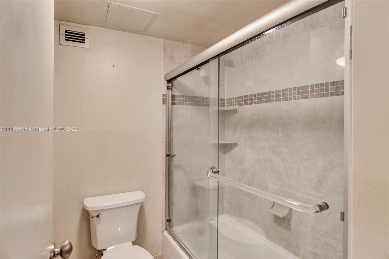 Millionaire's Row Miami Beach, FL 33140 - Photo 37 of 41 a bathroom with a shower and toilet