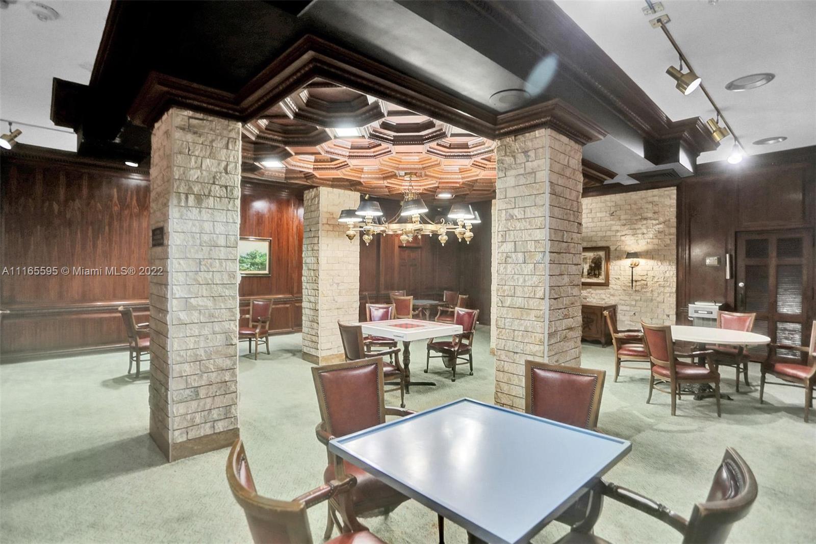 Millionaire's Row Miami Beach, FL 33140 - Photo 38 of 41 a dining room with furniture and wooden floor