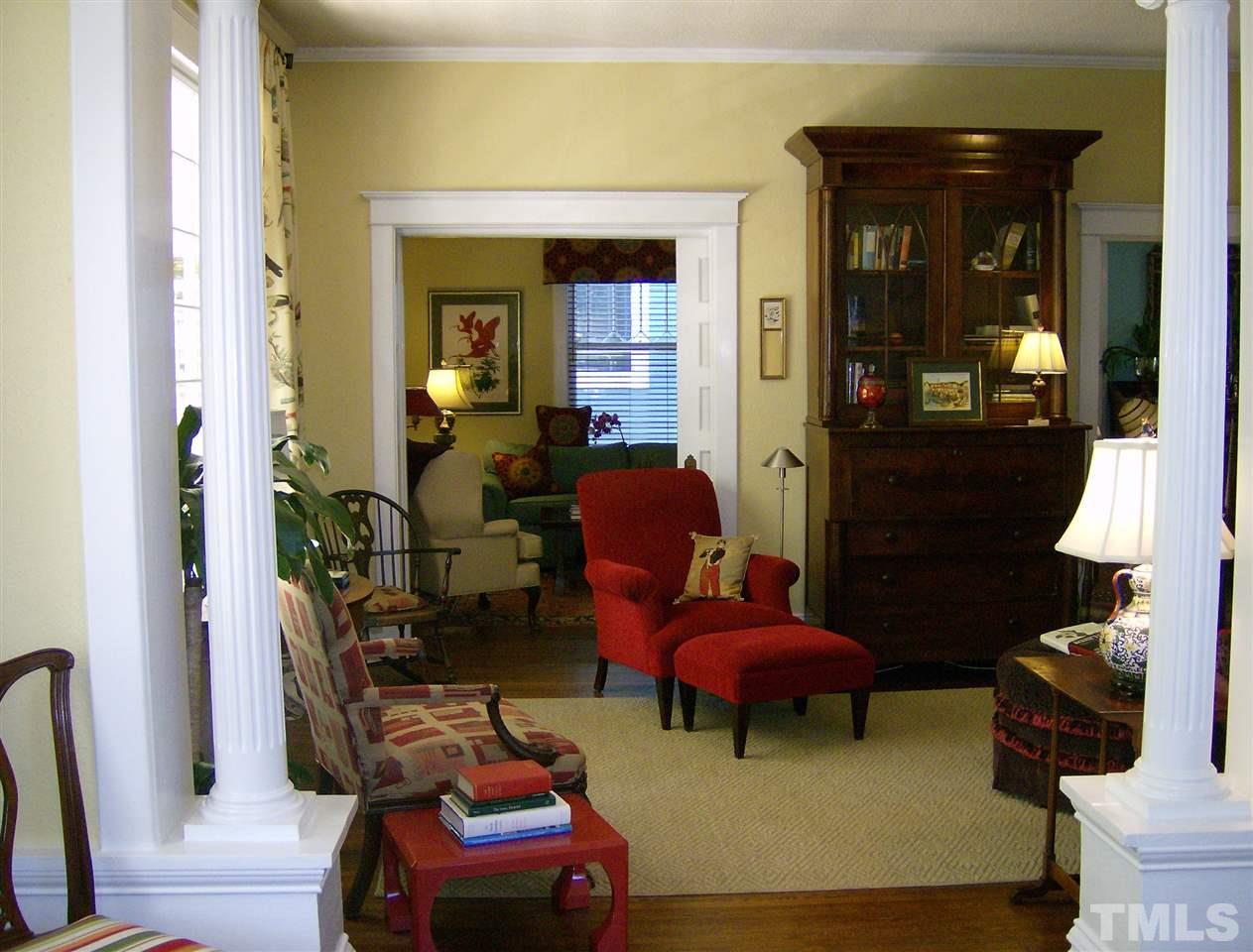 221 Forest Road Raleigh, NC 27605 - Photo 4 of 25 a living room with furniture and wooden floor