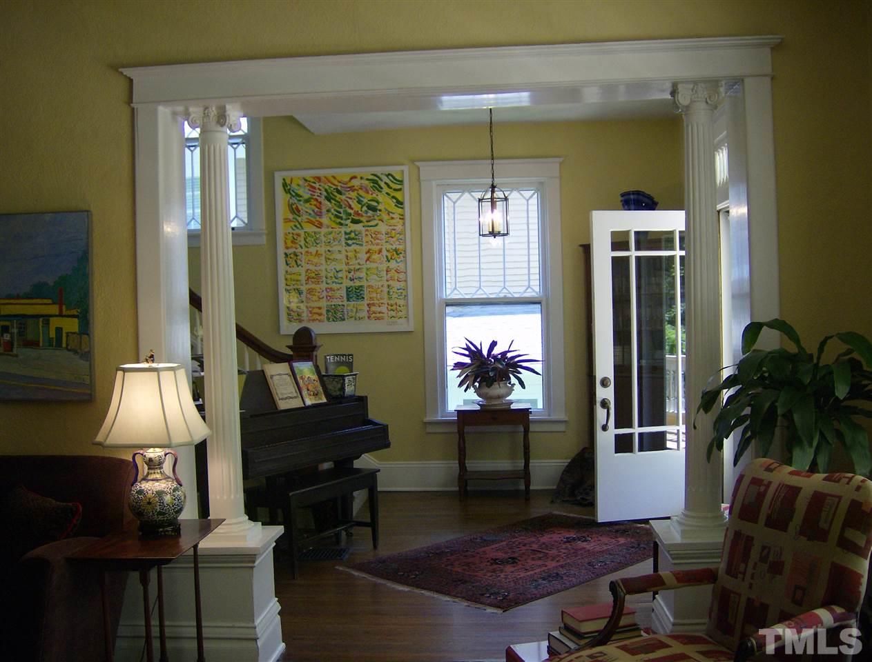 221 Forest Road Raleigh, NC 27605 - Photo 9 of 25 a living room with furniture and a window