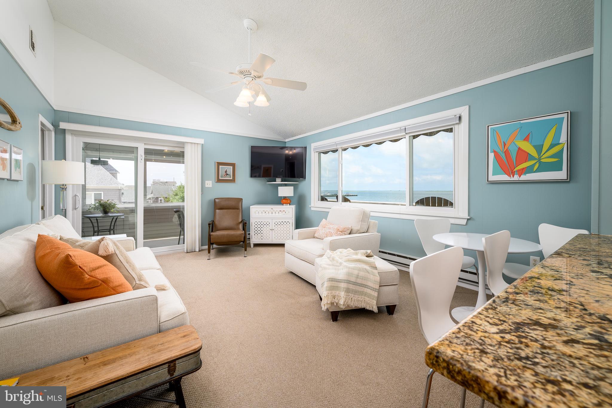 24 Joan Road Long Beach Township, NJ 08008 - Photo 18 of 66 a living room with furniture and a large window