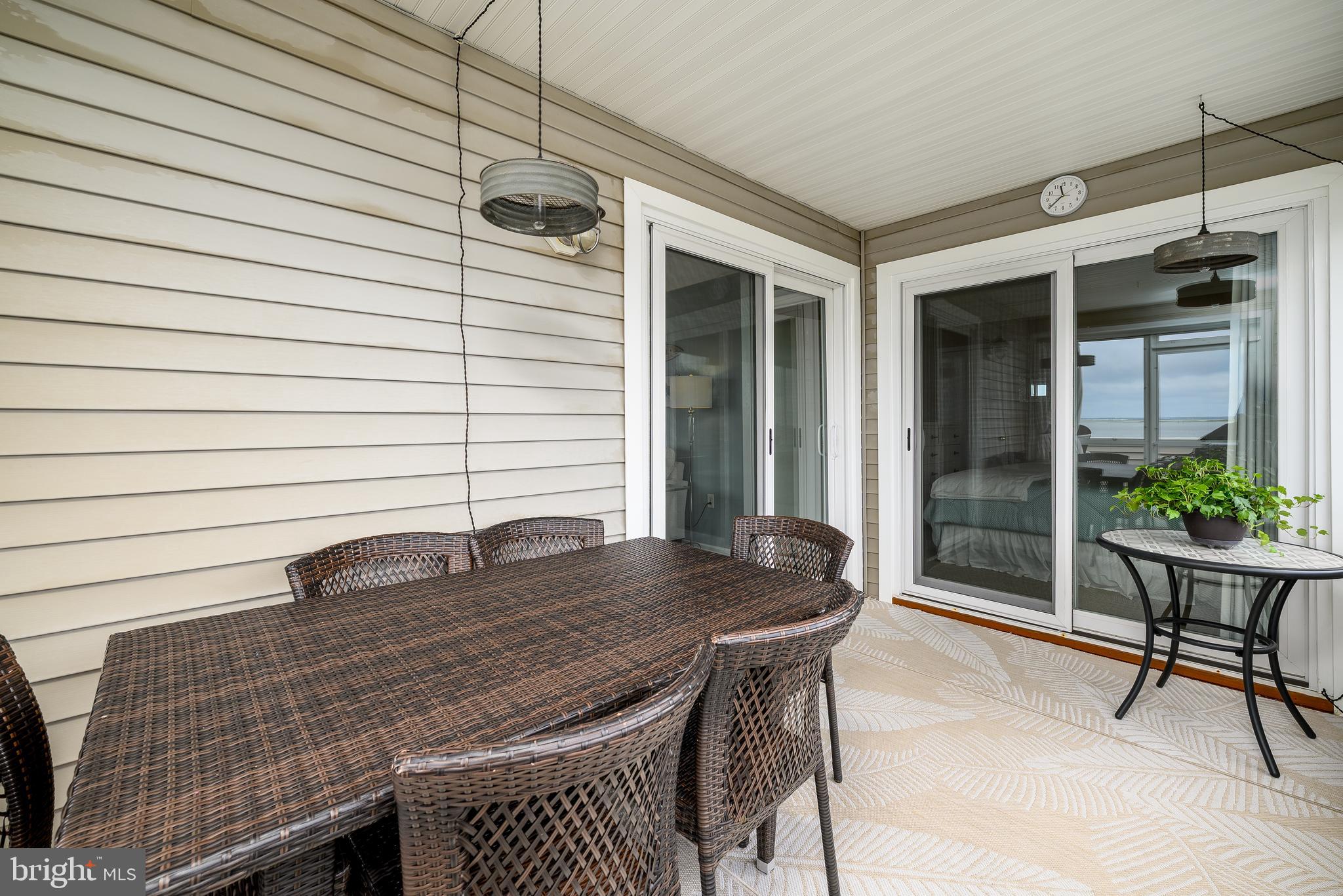 24 Joan Road Long Beach Township, NJ 08008 - Photo 31 of 66 a backyard of a house with table and chairs