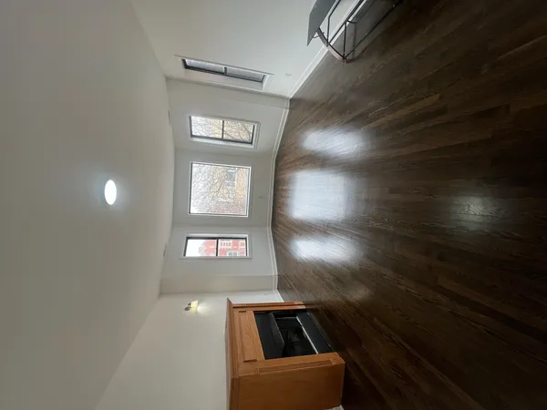 a view of an empty room and window