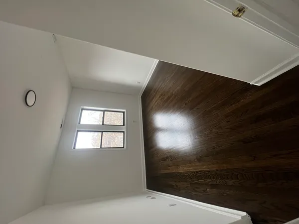 a view of an empty room and window
