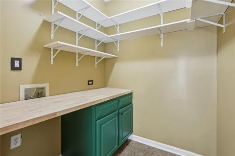 a bathroom with a sink and vanity