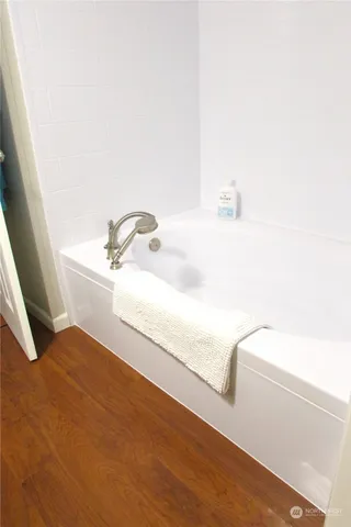 a bathroom with a sink and a bathtub