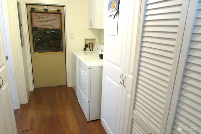 a view of a bathroom from a hallway