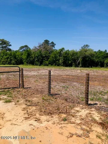 a view of outdoor space with yard