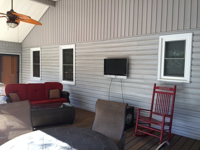 1630 Johnson Road Musella, GA 31066 - Photo 2 of 28 a outdoor living space with furniture and a fireplace
