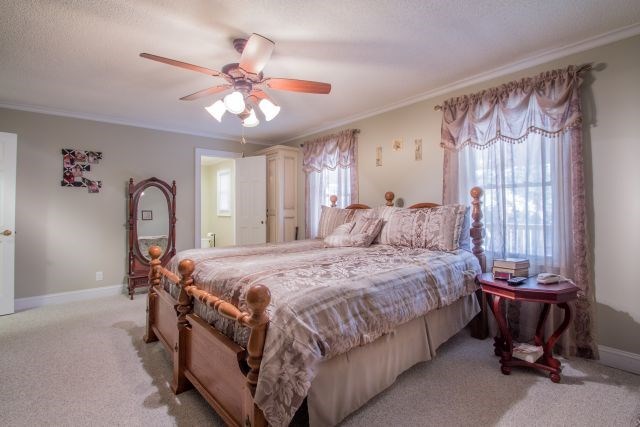 1630 Johnson Road Musella, GA 31066 - Photo 14 of 28 a bedroom with a bed and a window