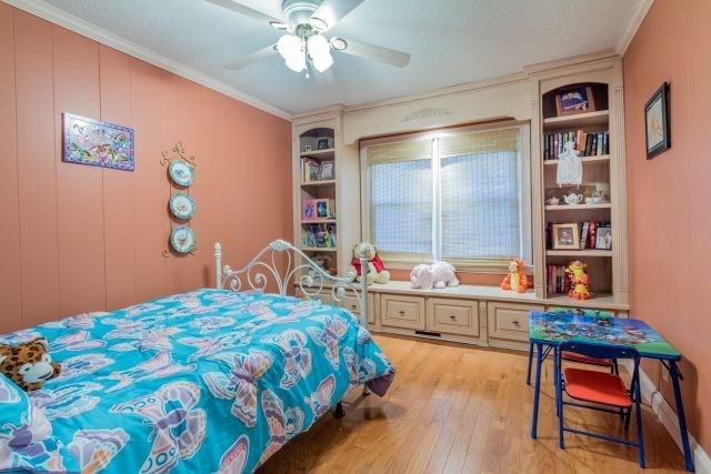 1630 Johnson Road Musella, GA 31066 - Photo 16 of 28 a bedroom with a bed and a table in it