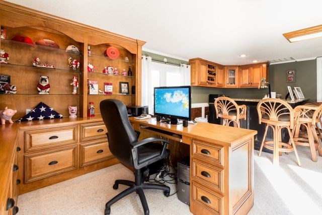 1630 Johnson Road Musella, GA 31066 - Photo 17 of 28 a view of a workspace with furniture and a kitchen