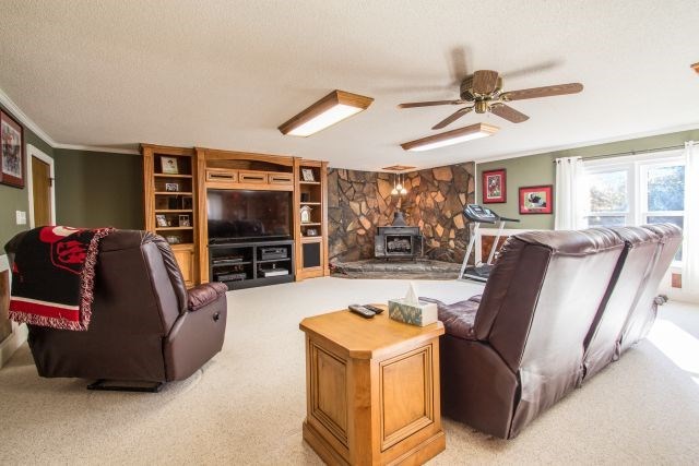 1630 Johnson Road Musella, GA 31066 - Photo 18 of 28 a living room with furniture and a flat screen tv