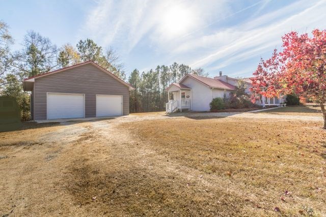 1630 Johnson Road Musella, GA 31066 - Photo 3 of 28 a view of a house with a yard