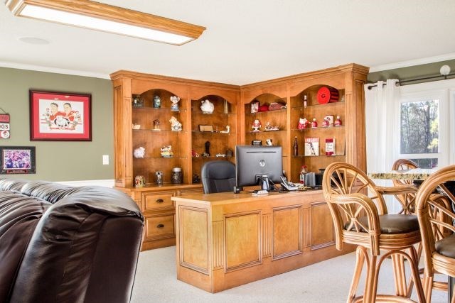 1630 Johnson Road Musella, GA 31066 - Photo 21 of 28 a view of a livingroom with furniture and workspace