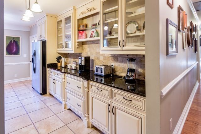 1630 Johnson Road Musella, GA 31066 - Photo 22 of 28 a kitchen with stainless steel appliances cabinets and a window