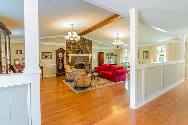 1630 Johnson Road Musella, GA 31066 - Photo 23 of 28 a living room with furniture and a chandelier