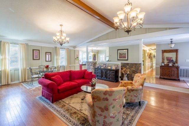 1630 Johnson Road Musella, GA 31066 - Photo 26 of 28 a living room with furniture a chandelier and a chandelier