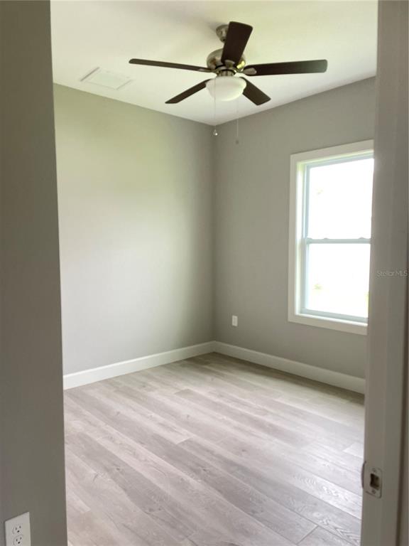 2563 Longworthy Road North Port, FL 34288 - Photo 7 of 7 a view of an empty room with a window