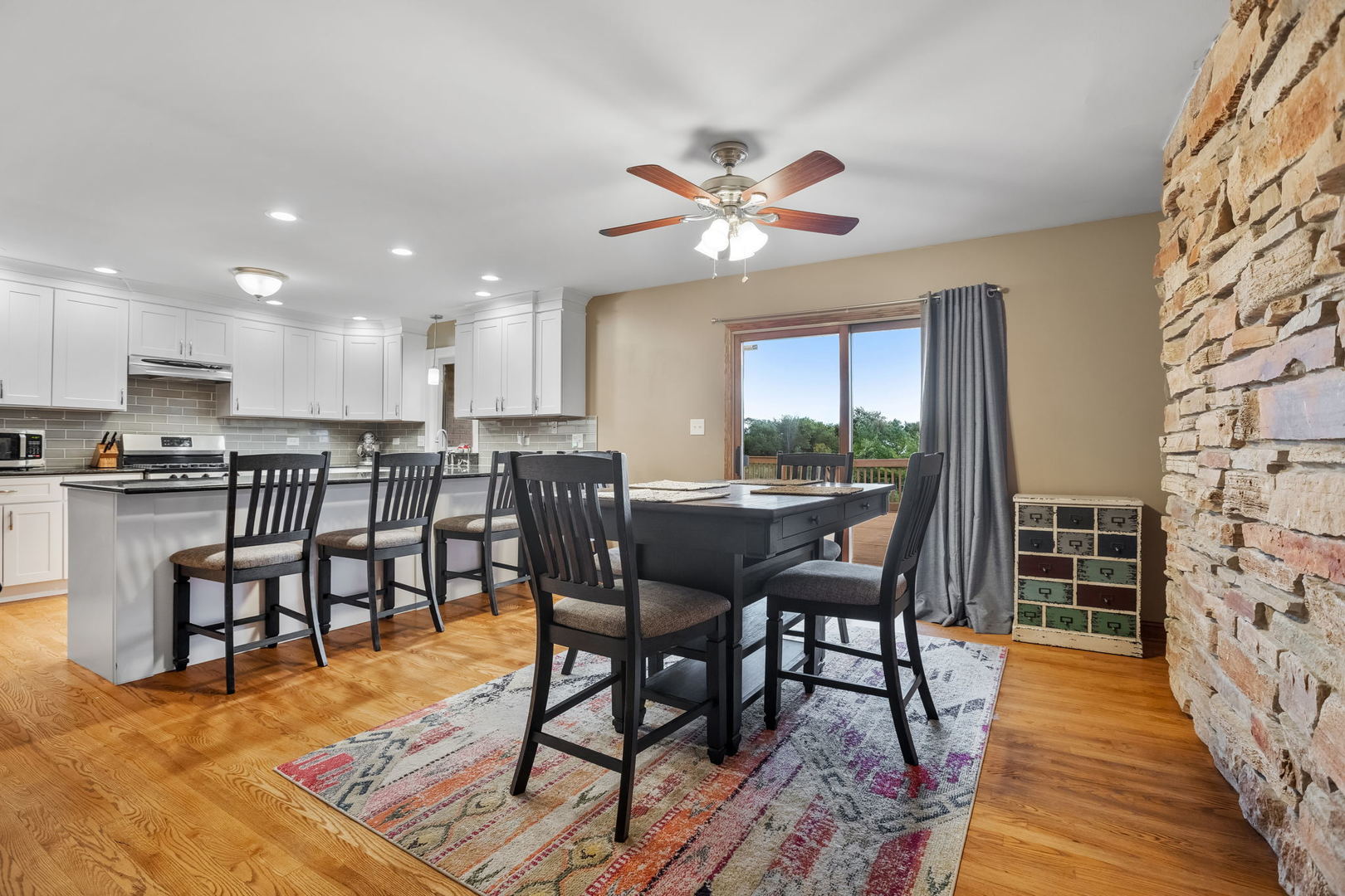 2050 South Spencer Road New Lenox, IL 60451 - Photo 18 of 33 a view of a dining room with furniture window and wooden floor