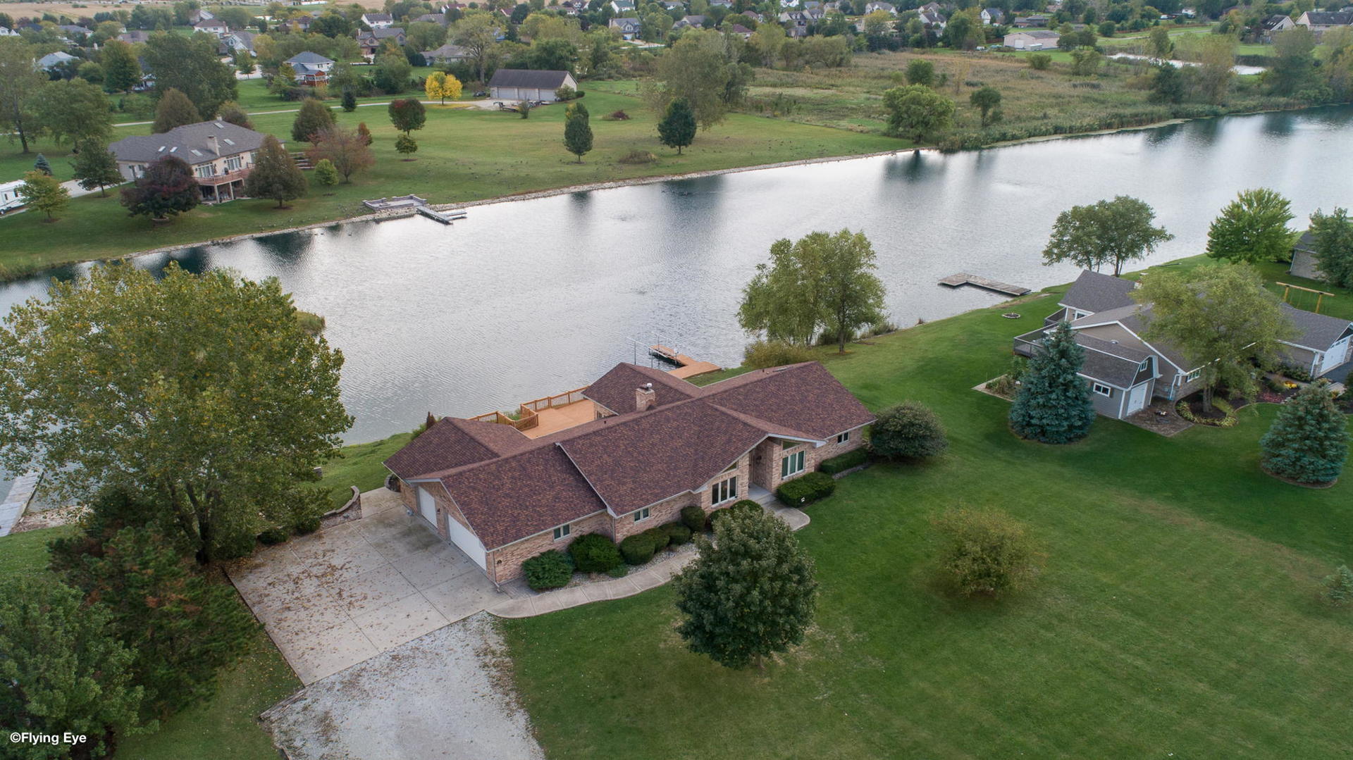 2050 South Spencer Road New Lenox, IL 60451 - Photo 4 of 33 an aerial view of a house with a lake view