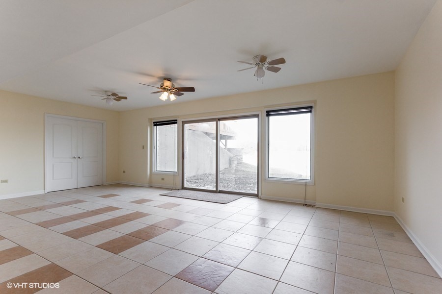 2050 South Spencer Road New Lenox, IL 60451 - Photo 31 of 33 a view of an empty room with a window