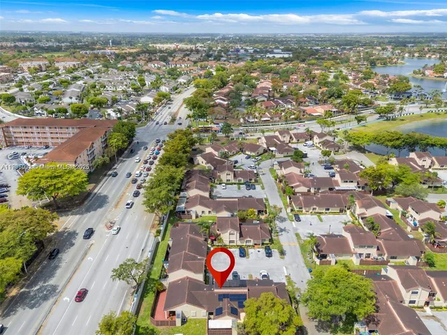 an aerial view of residential building and city street