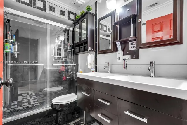 a bathroom with a sink and a toilet