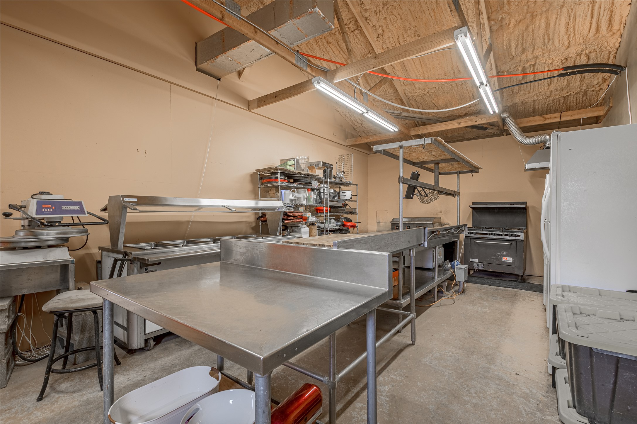 47-57 Stage Coach Road Coldspring, TX 77331 - Photo 42 of 50 a kitchen with a table and chairs