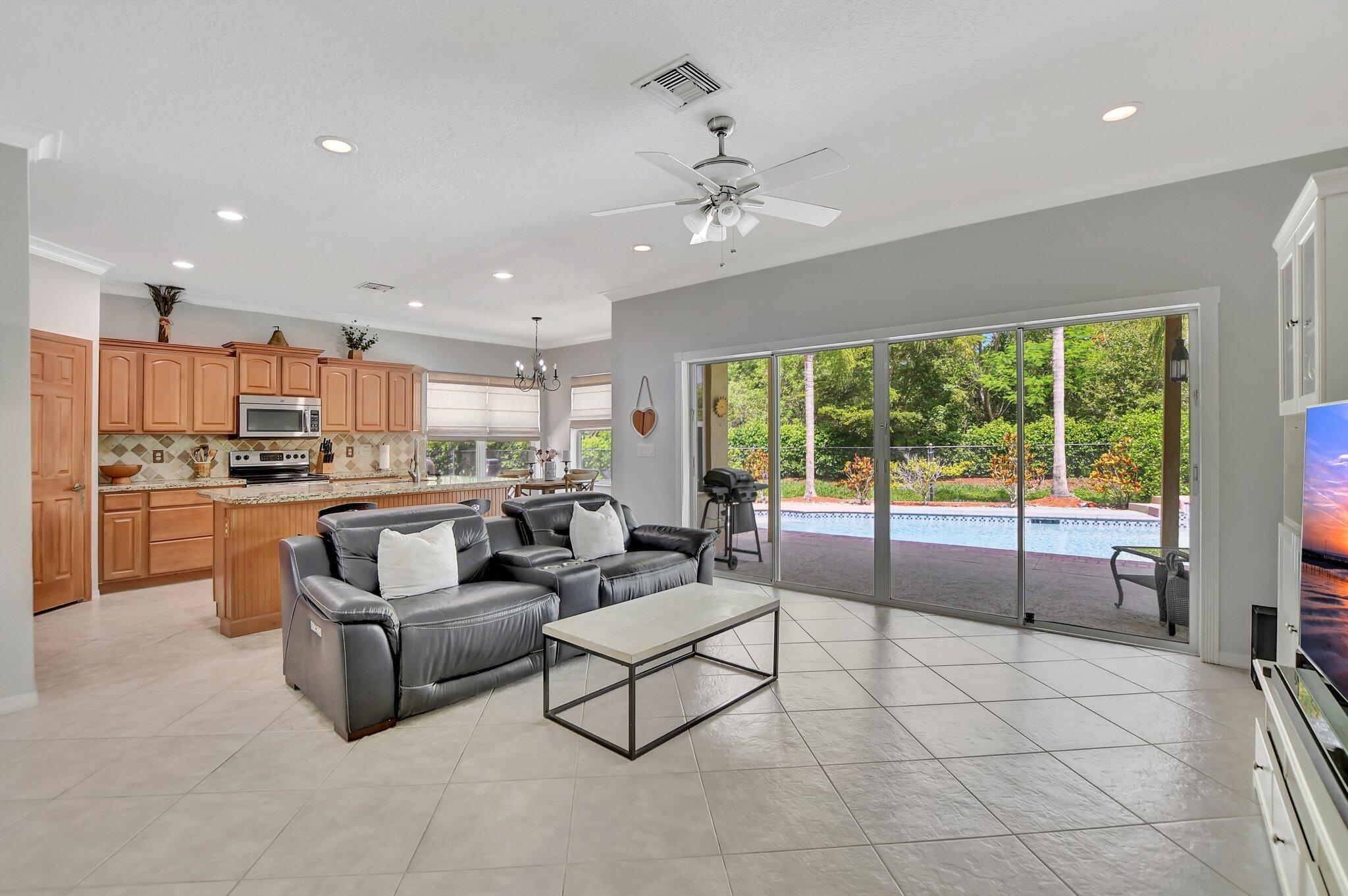 21783 Philmont Court Boca Raton, FL 33428 - Photo 6 of 31 Family Room & Kitchen
