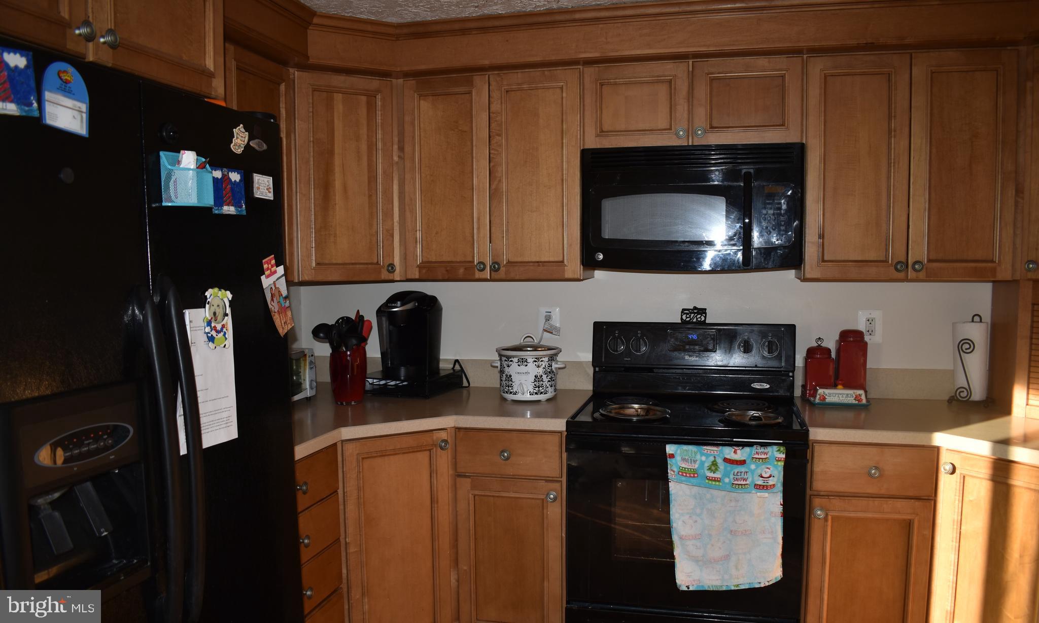 4 Hyacinth Road Baltimore, MD 21234 - Photo 11 of 33 a kitchen with a cabinets and a stove top oven