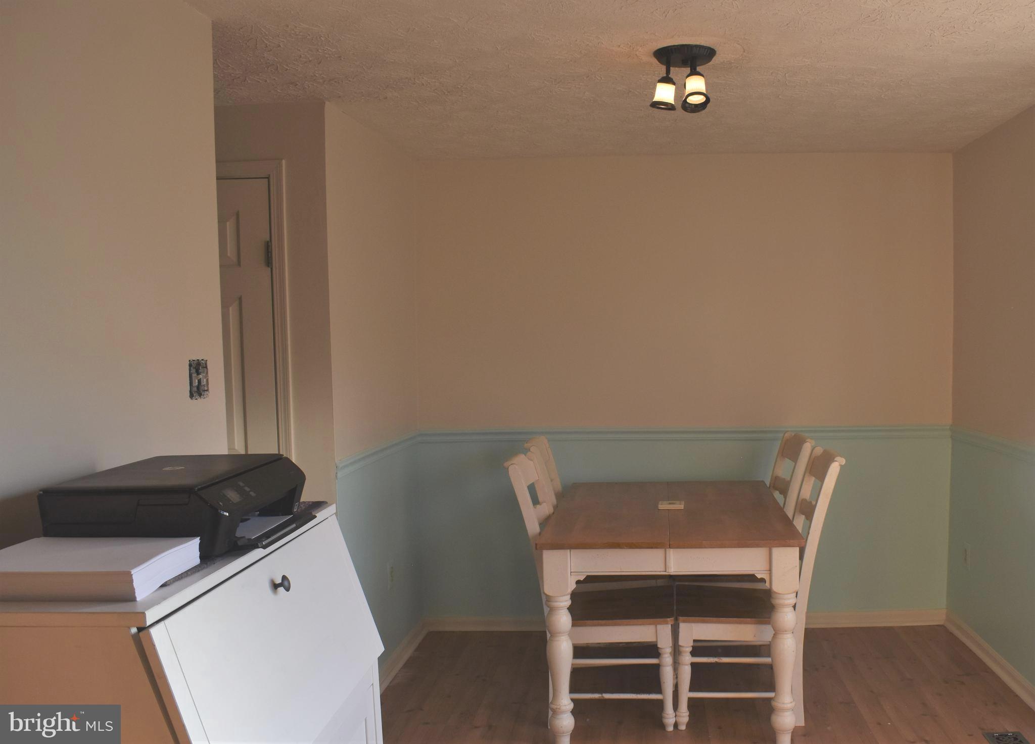 4 Hyacinth Road Baltimore, MD 21234 - Photo 12 of 33 a view of a workspace with furniture