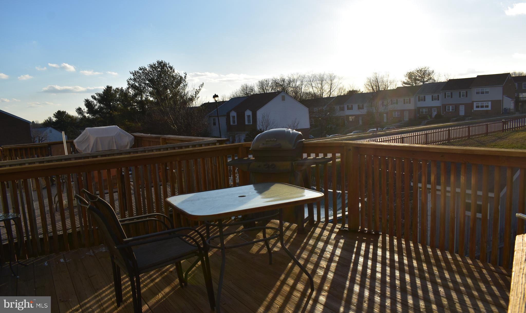 4 Hyacinth Road Baltimore, MD 21234 - Photo 13 of 33 a terrace of a house with table and chairs