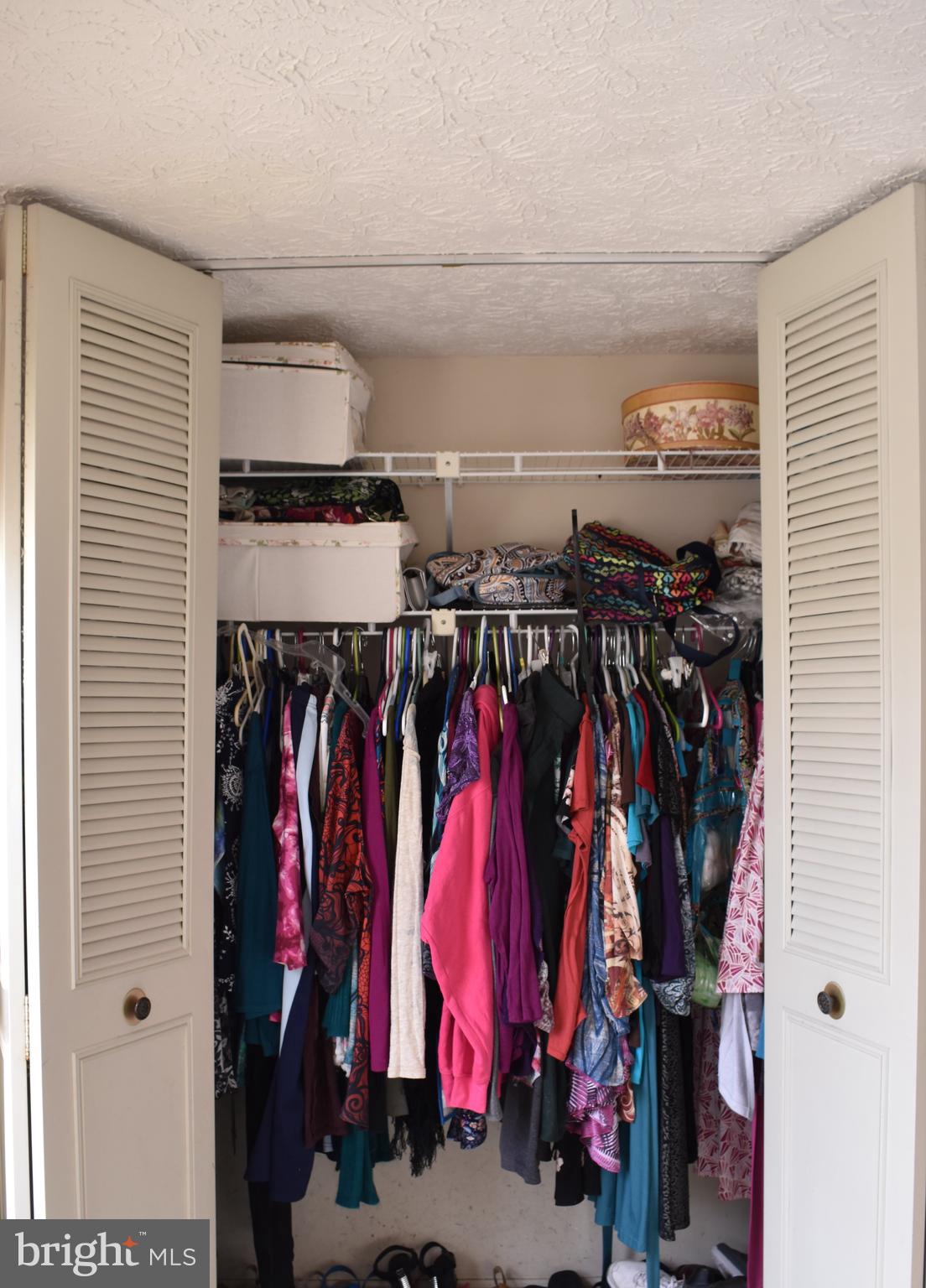 4 Hyacinth Road Baltimore, MD 21234 - Photo 24 of 33 a view of walk in closet with clothes and shoes