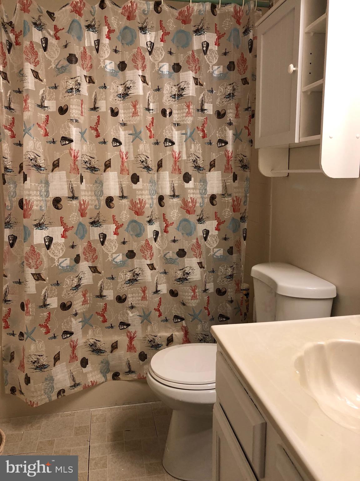 4 Hyacinth Road Baltimore, MD 21234 - Photo 26 of 33 a bathroom with a toilet and a sink