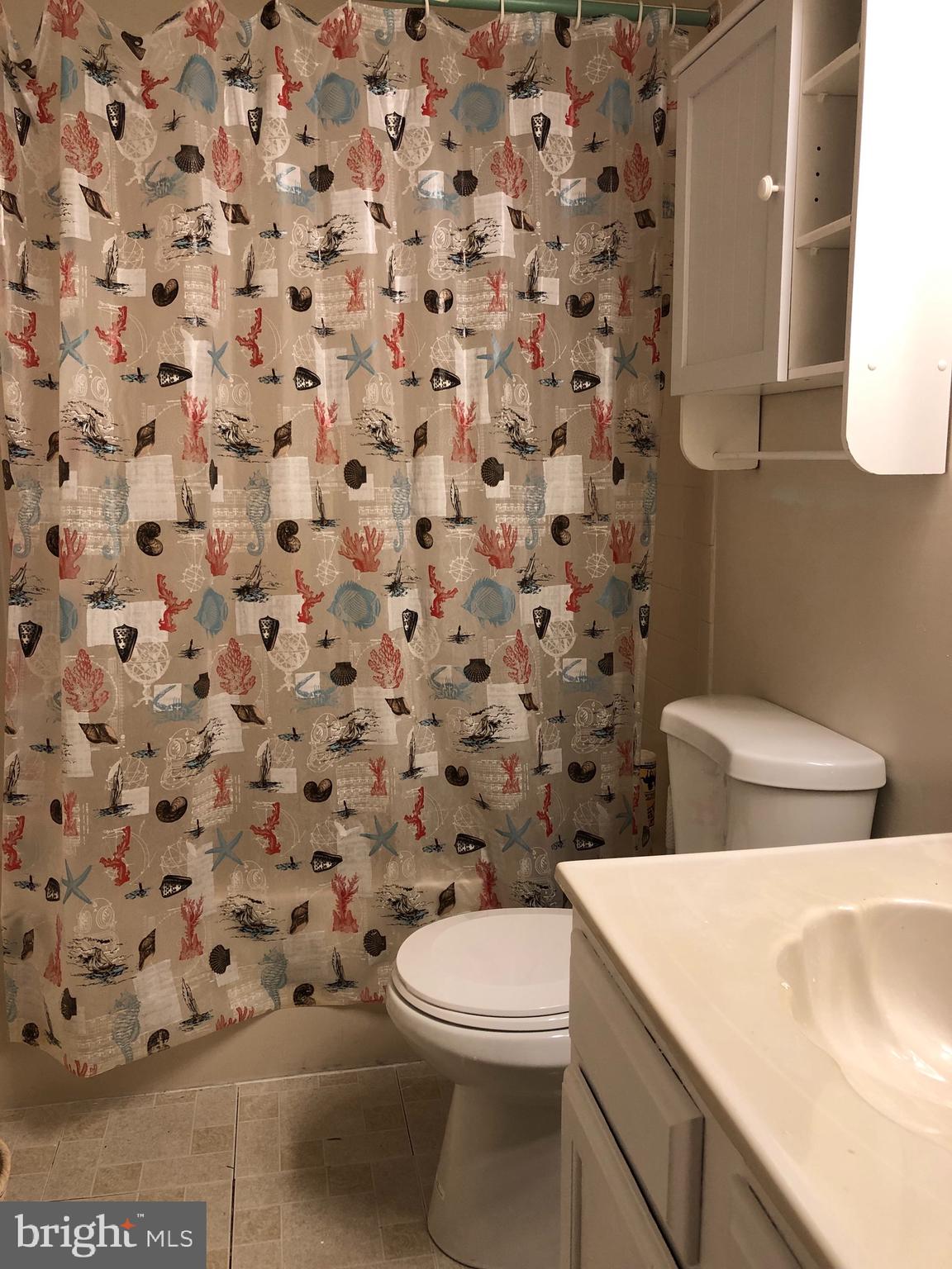 4 Hyacinth Road Baltimore, MD 21234 - Photo 27 of 33 a bathroom with a toilet and a sink