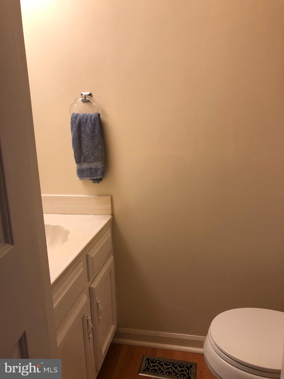 4 Hyacinth Road Baltimore, MD 21234 - Photo 6 of 33 a bathroom with a sink and toilet