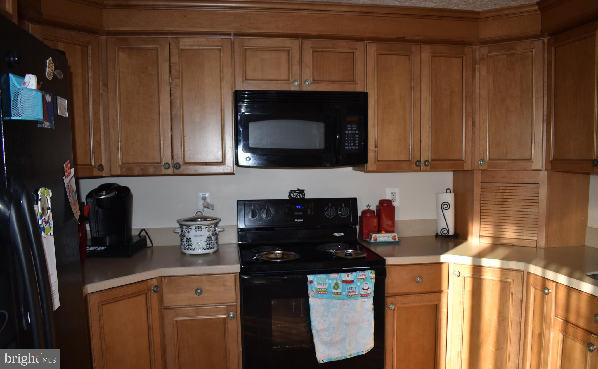 4 Hyacinth Road Baltimore, MD 21234 - Photo 9 of 33 a kitchen with a sink a stove and cabinets