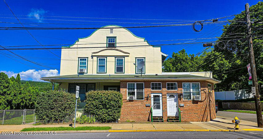 a front view of a house with porch