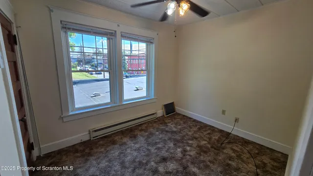 an empty room with window