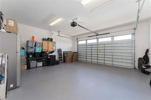 a view of a garage with furniture and a window